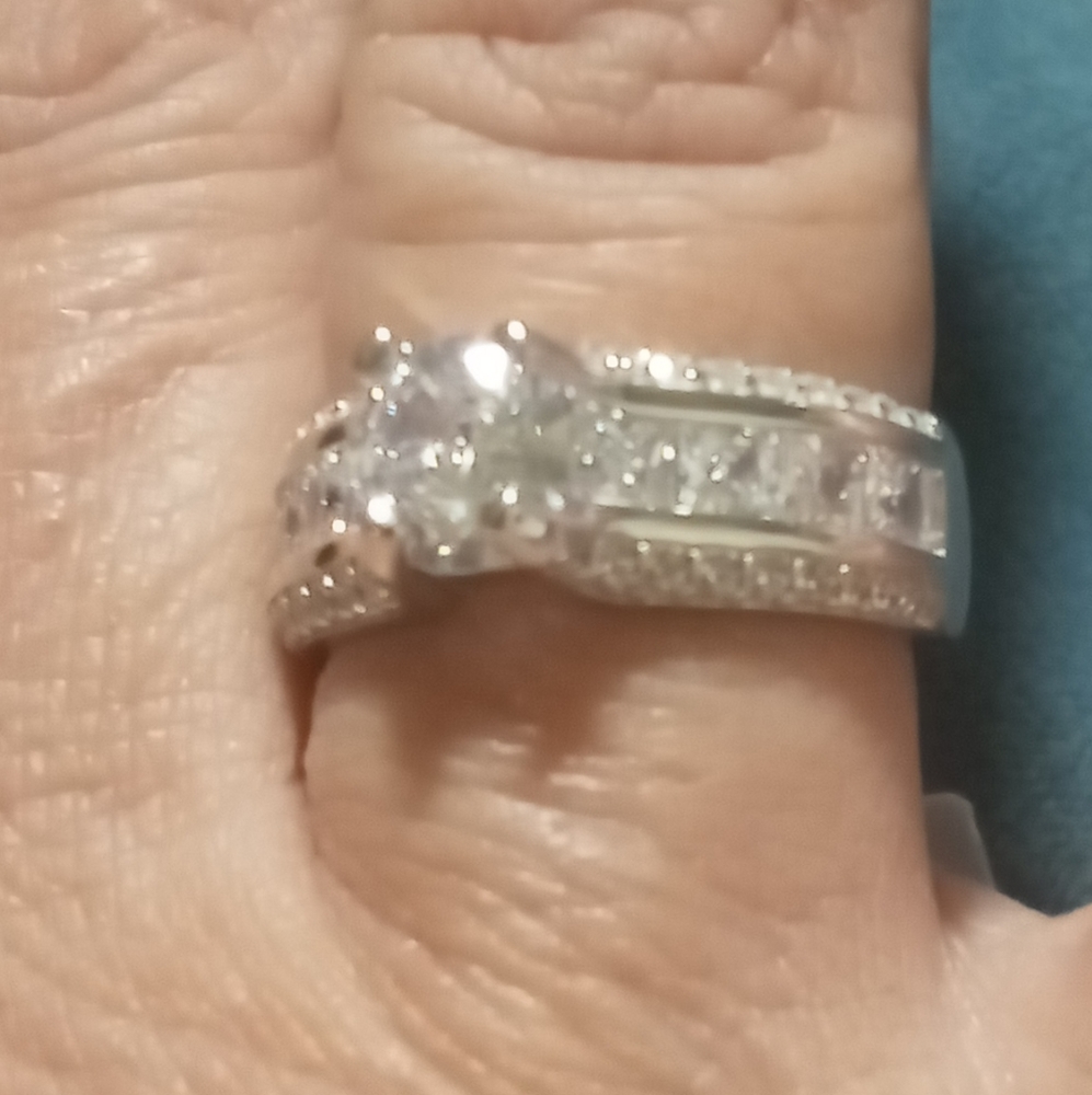 Engagement Ring Round vintage style cubic zirconia princess cut cz side stones.